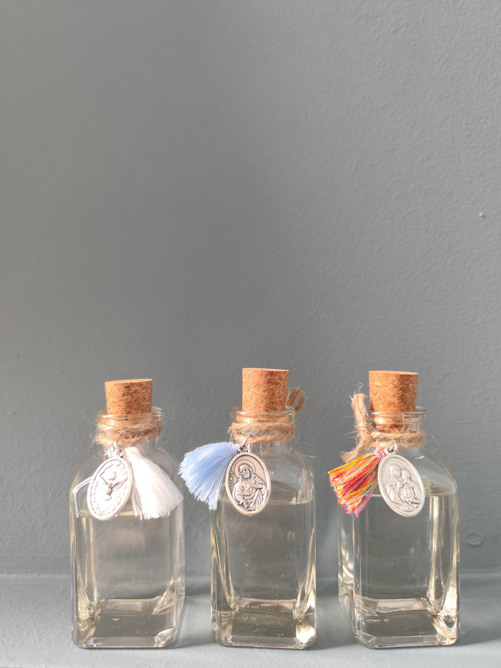 Frascos de Agua Bendita con Medalla